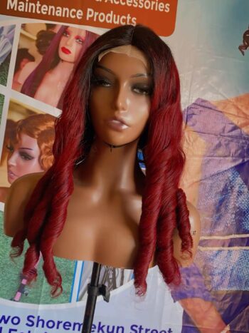 Low grade human hair 4by4 T closure bounce wig( Accepts heat)